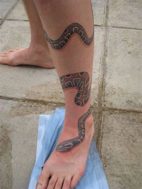 snake tattoos on leg|70 Snake Tattoo on Leg Designs to Wrap Your Head。